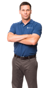 A DryMetrics employee wearing man a company shirt